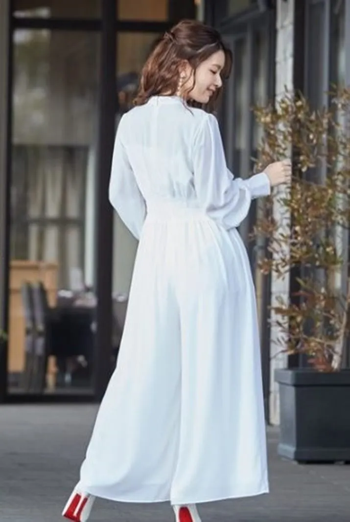 ---Abito da sposa con pantaloni alla moda fatto in chiffon con maniche lunghe a sbuffo, collo alto--