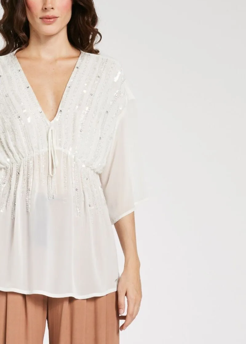 Blusa con paillette