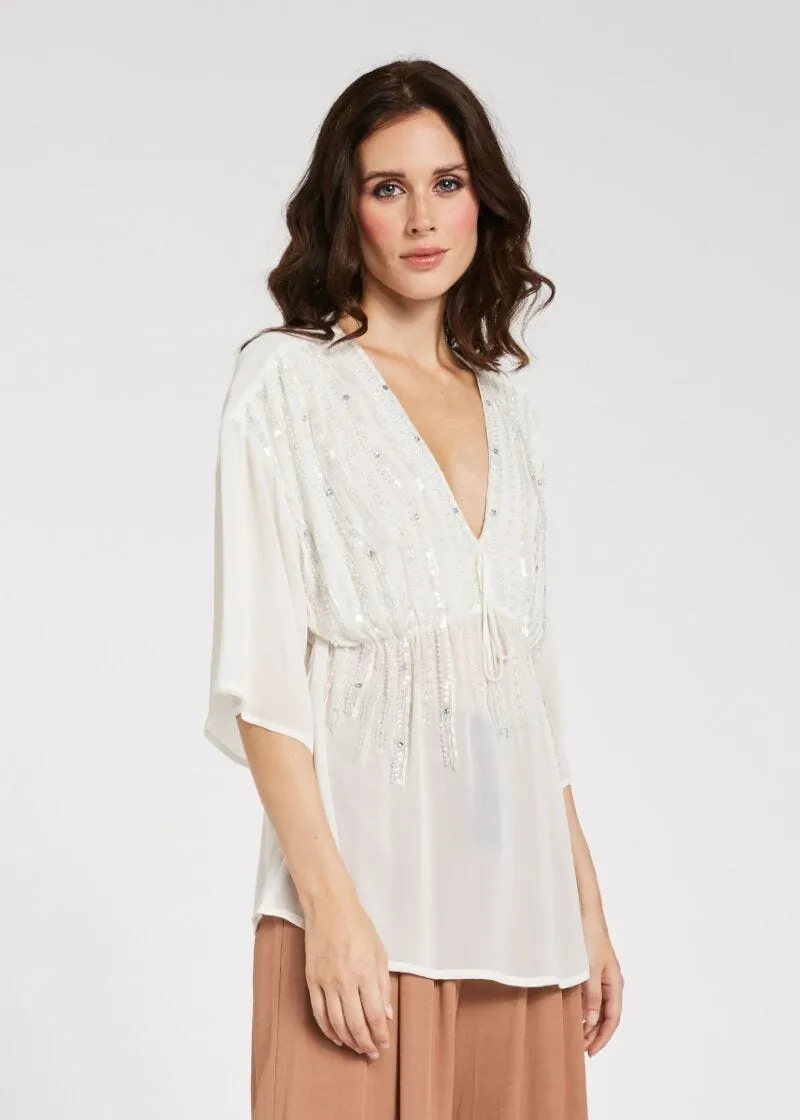 Blusa con paillette
