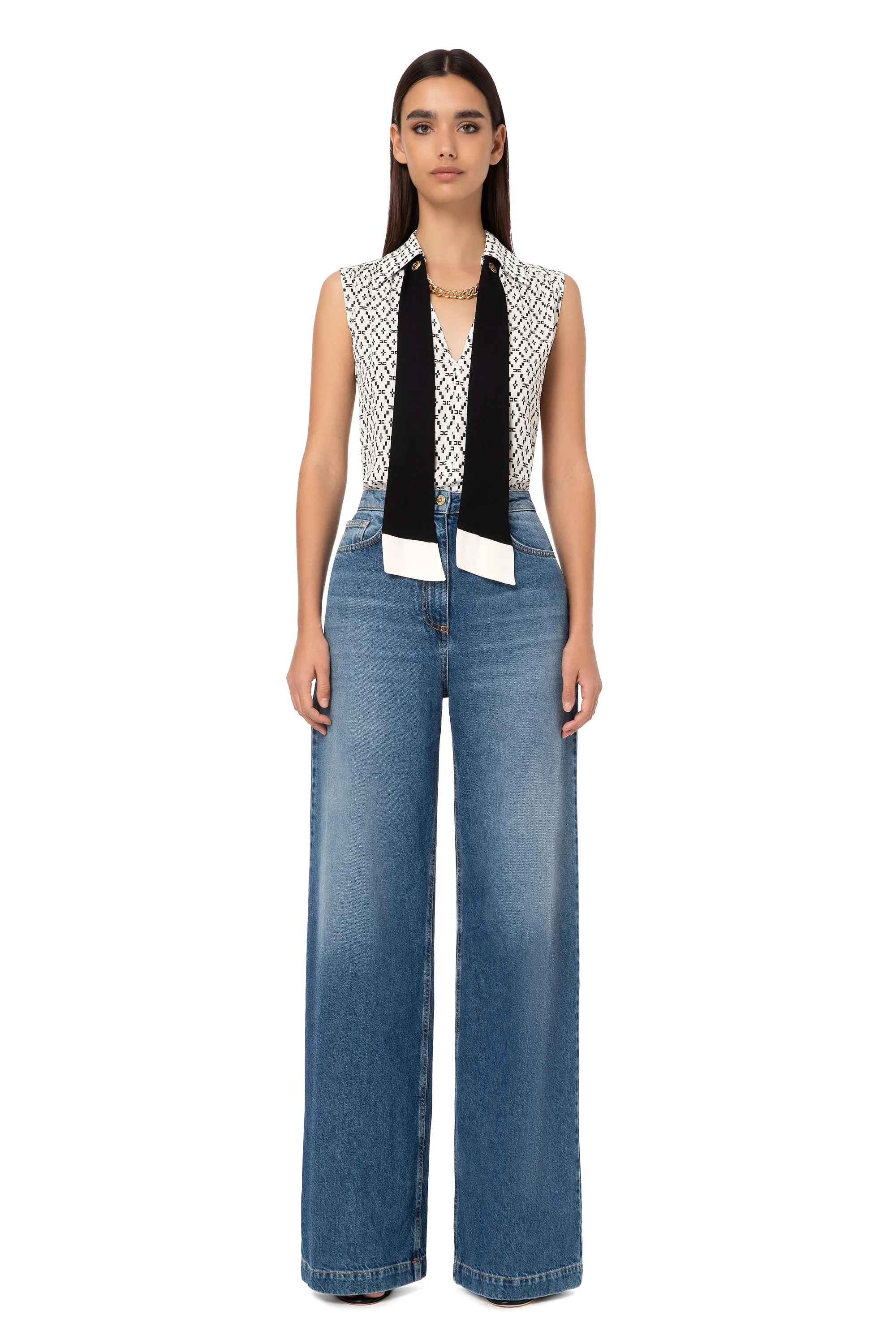 Blusa smanicata