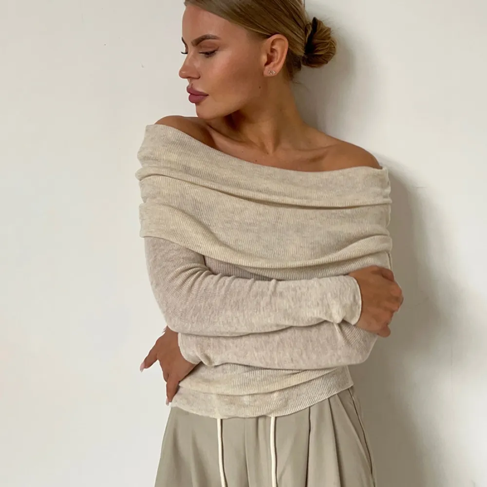 Maglione con spalle scoperte Europa e America 2024 Primavera femminile Slim Tinta unita Pullover Colletto a una linea Swe a mani