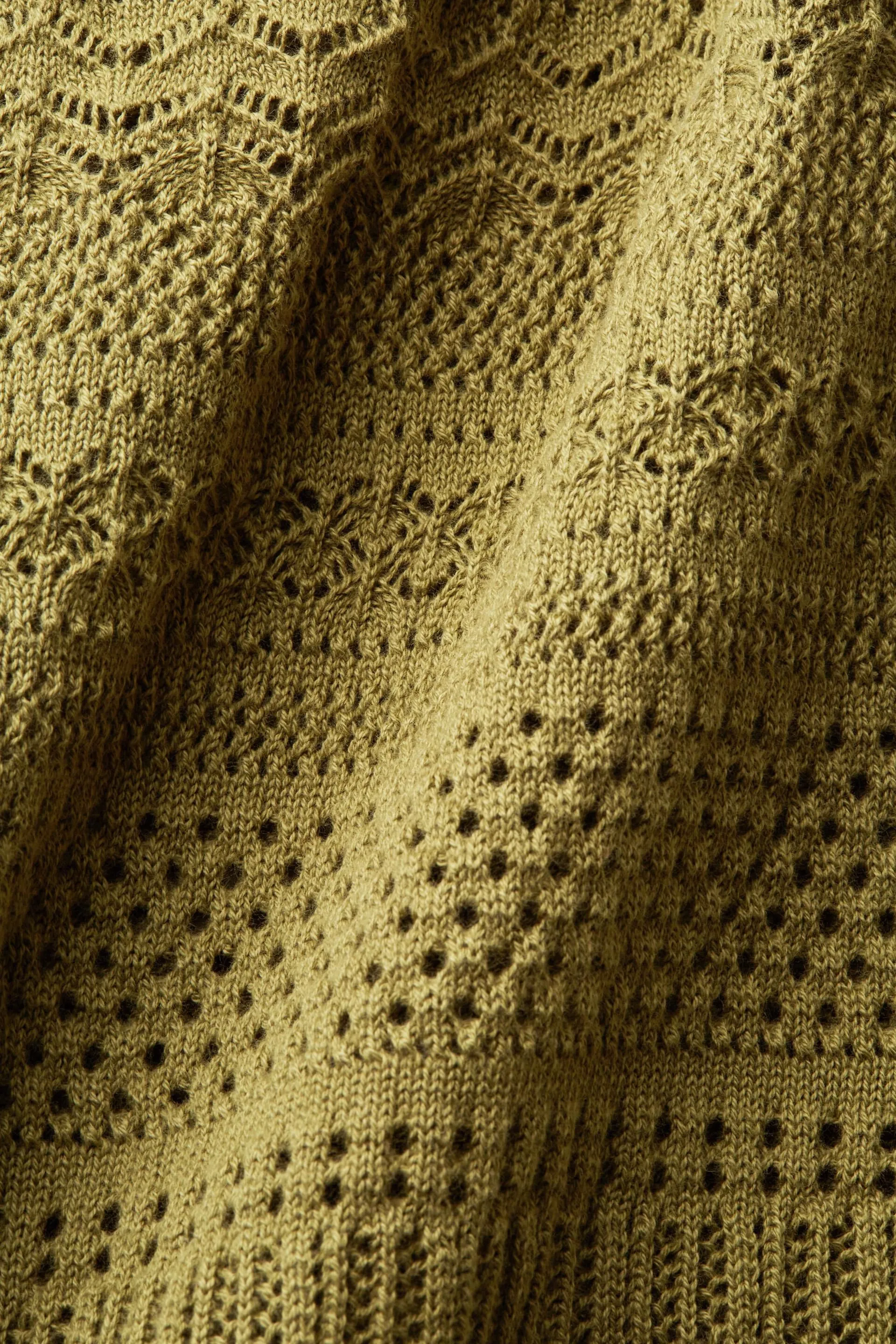 Top in cotone a maglia aperta